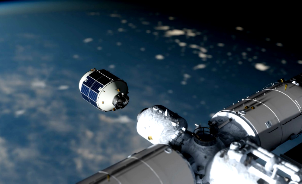 轻舟货运飞船与中国空间站对接示意图。(中国科学院微小卫星创新研究院供图)